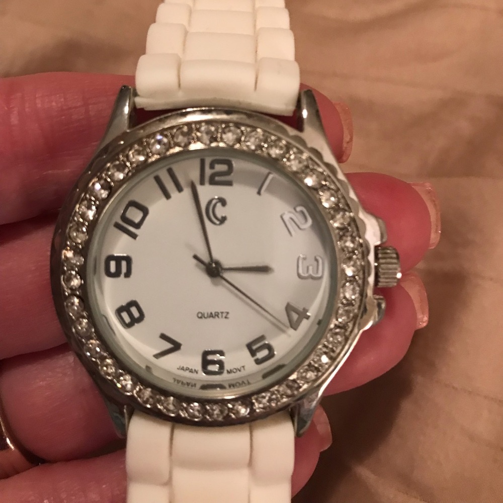 Watch with white band. NWOT